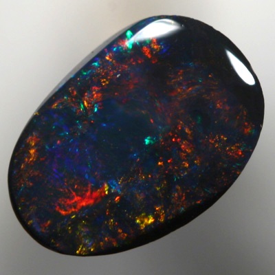 SOLID BLACK OPAL Very sparkly cherry red and green